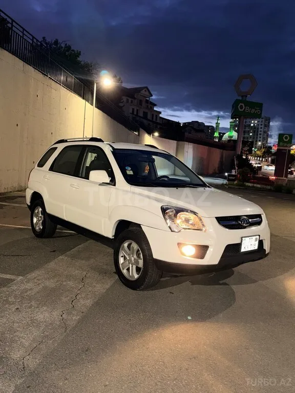 Kia Sportage — фото 4/4
