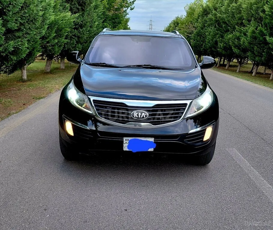 Kia Sportage — foto 1/4