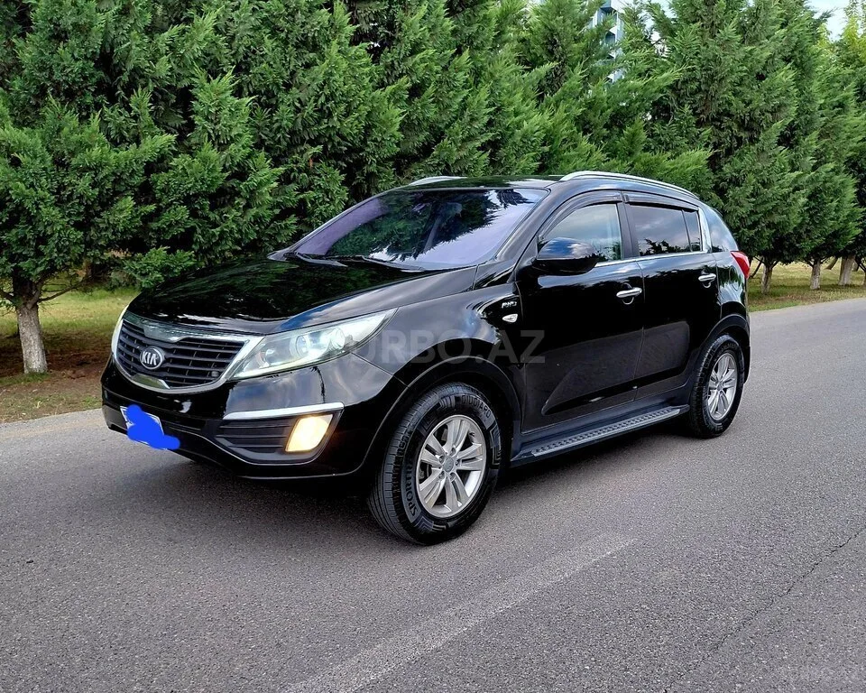 Kia Sportage — foto 4/4