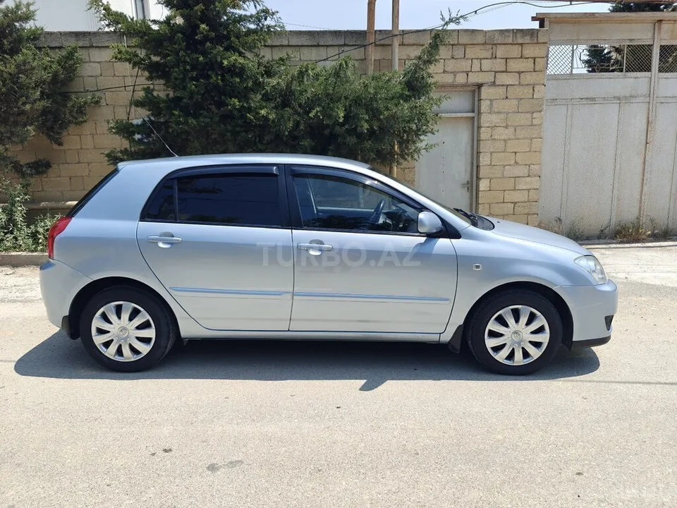 Toyota Corolla — foto 4/4