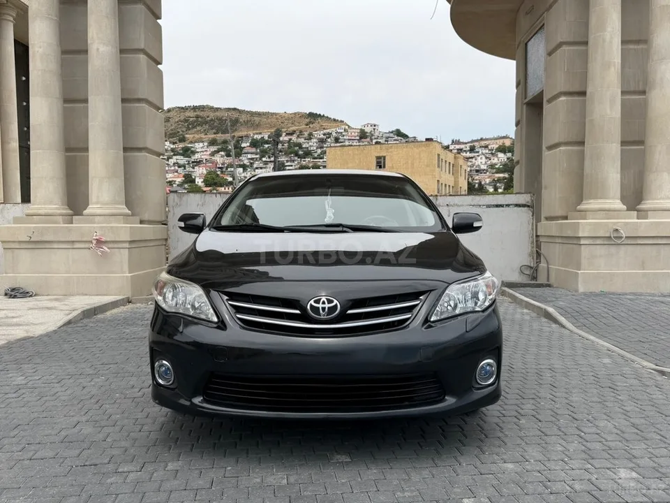 Toyota Corolla — фото 1/4