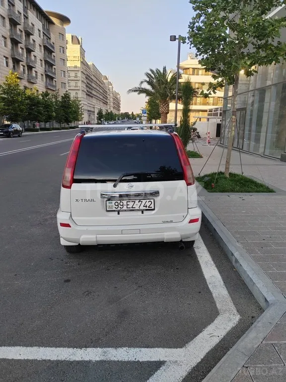 Nissan X-Trail — foto 2/4