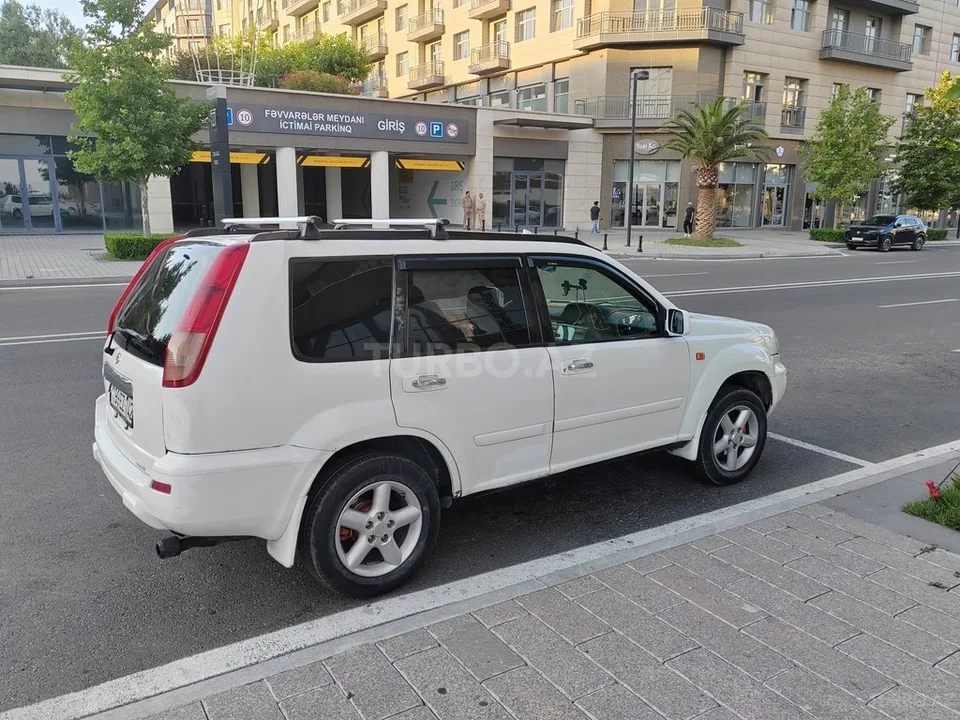 Nissan X-Trail — foto 3/4