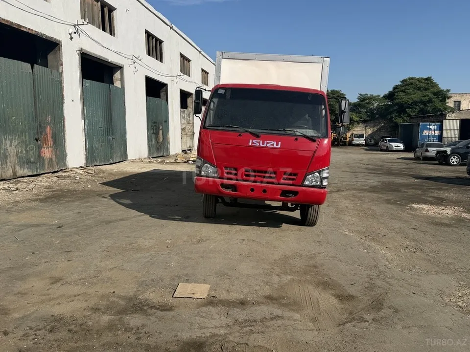 Isuzu NPR 66 L — foto 3/4