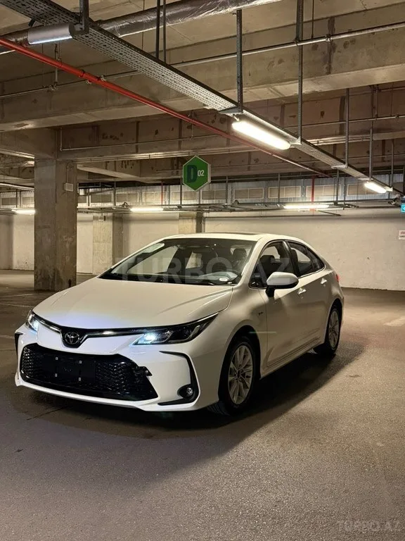 Toyota Corolla — foto 2/4