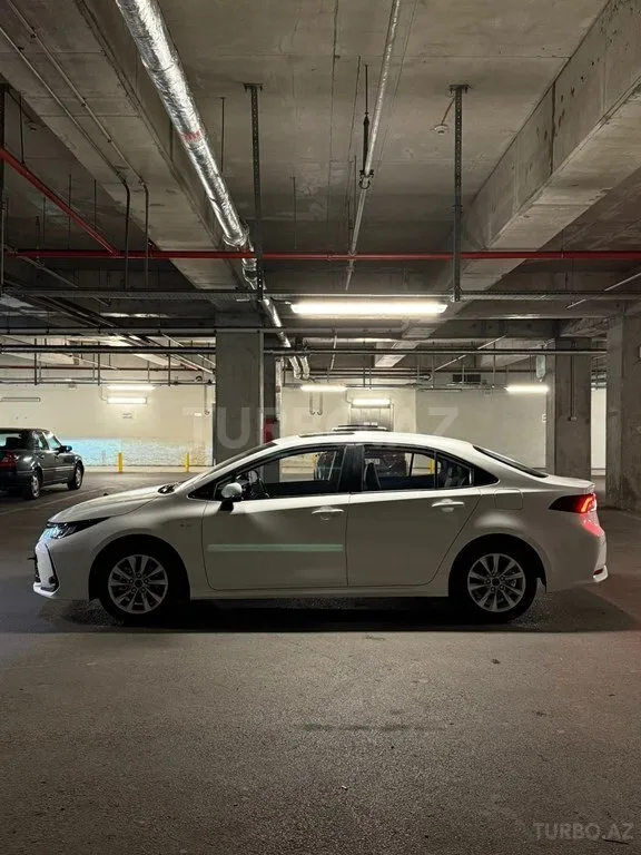 Toyota Corolla — foto 4/4