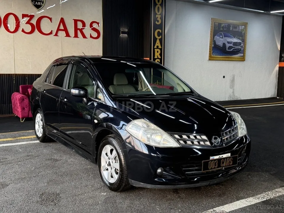Nissan Tiida — foto 2/4
