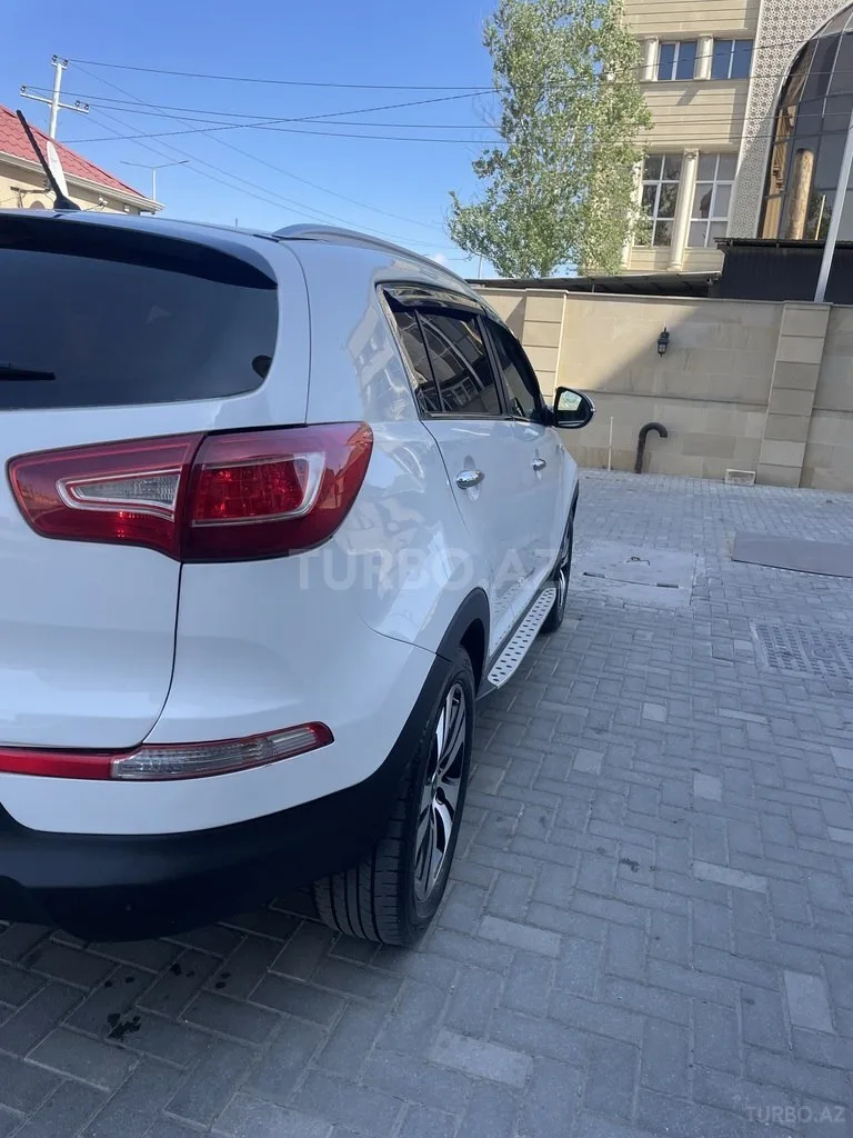 Kia Sportage — фото 4/4