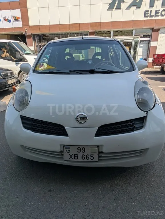 Nissan March — foto 1/4