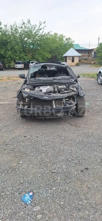 Kia Optima — foto 1/4