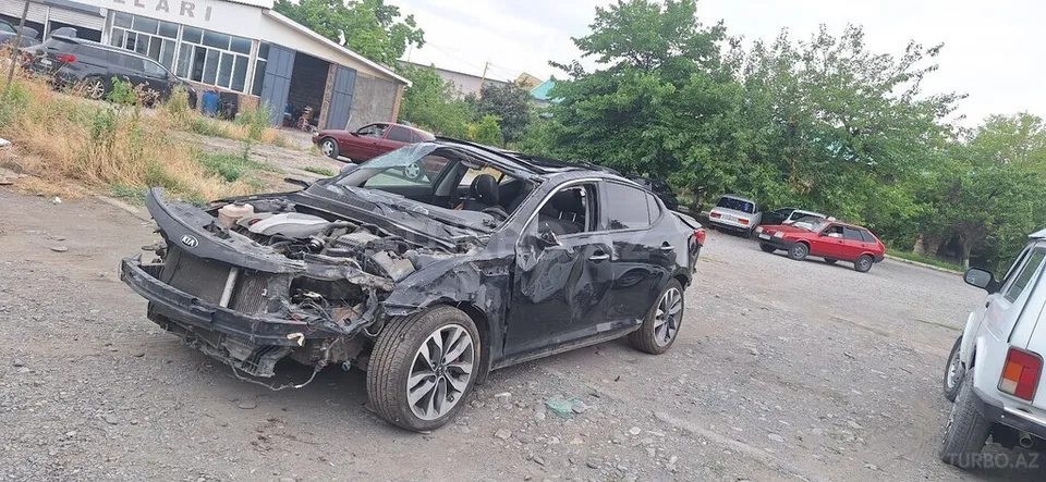 Kia Optima — foto 2/4