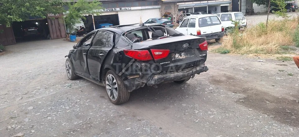 Kia Optima — foto 4/4