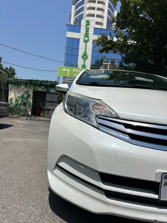 Nissan Note — фото 4/4
