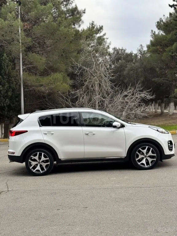 Kia Sportage — foto 4/4