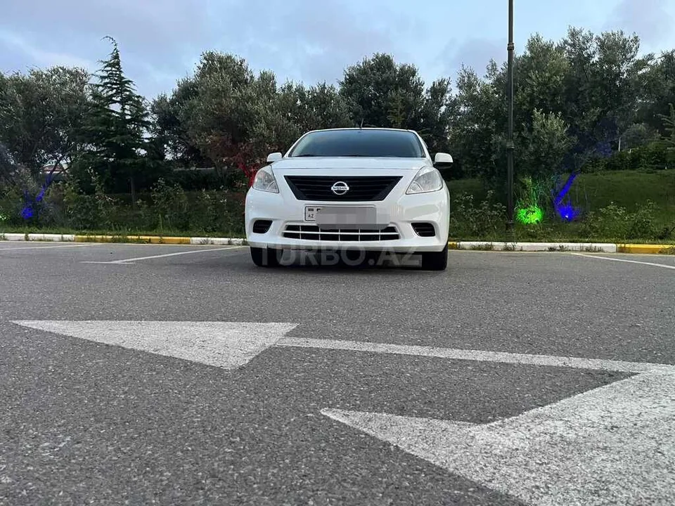 Nissan Sunny — foto 1/4