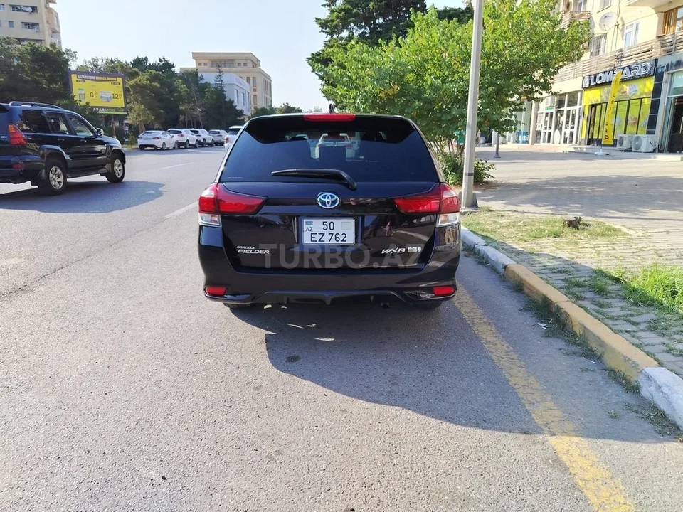 Toyota Corolla Fielder — foto 2/4