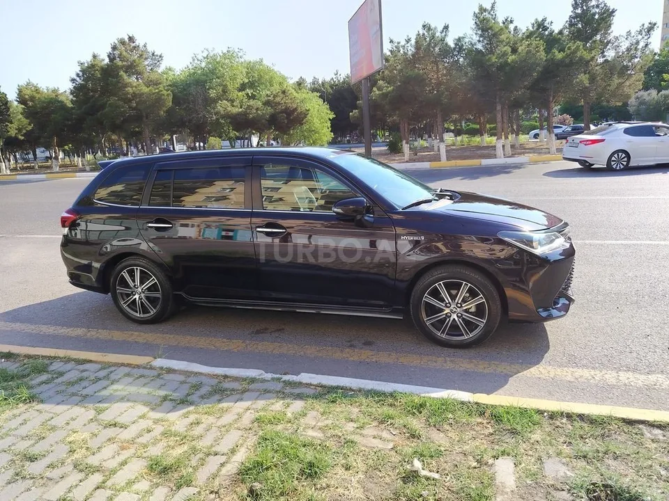 Toyota Corolla Fielder — foto 3/4