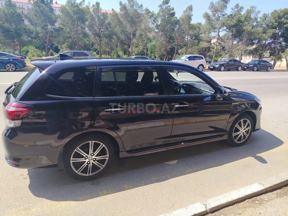 Toyota Corolla Fielder — foto 4/4
