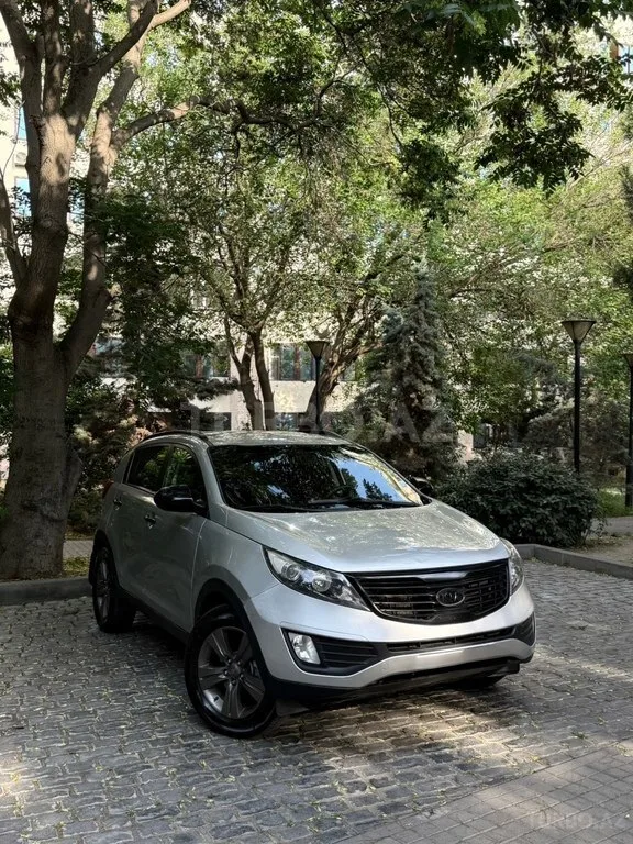 Kia Sportage — фото 1/4