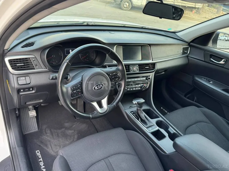 Kia Optima — foto 2/4