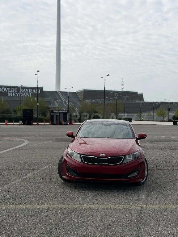 Kia Optima — foto 1/4