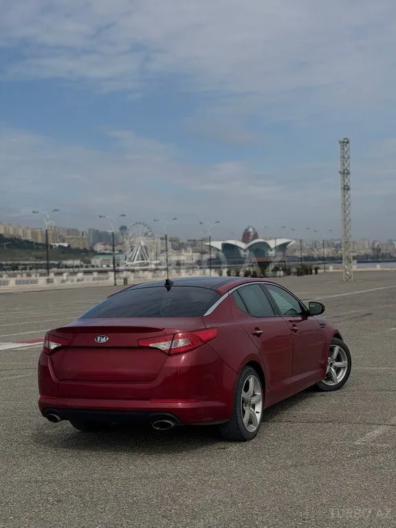 Kia Optima — foto 2/4