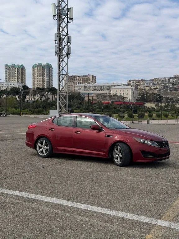 Kia Optima — foto 4/4