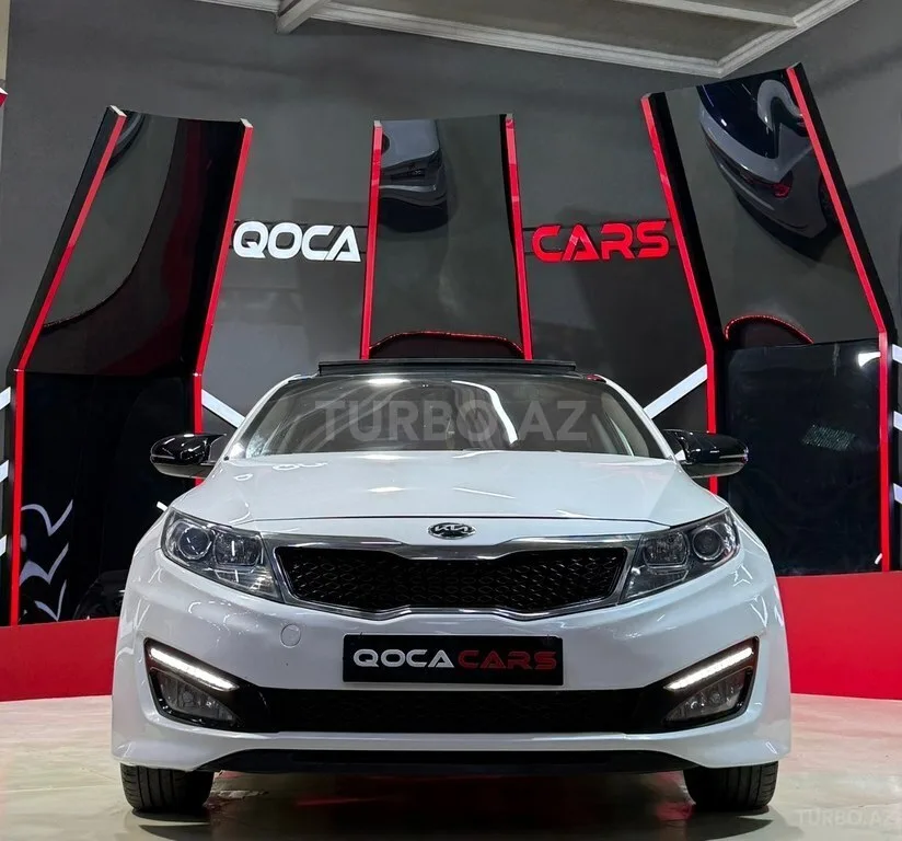 Kia Optima — foto 1/4