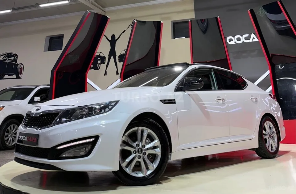 Kia Optima — foto 2/4