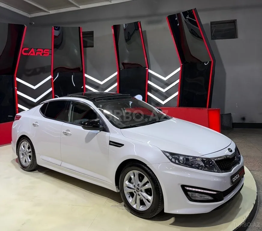 Kia Optima — foto 4/4
