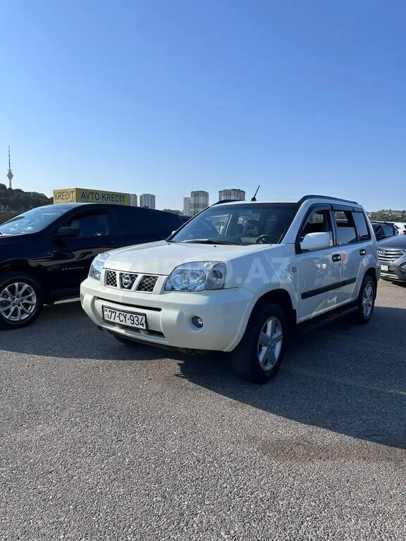 Nissan X-Trail — foto 1/4