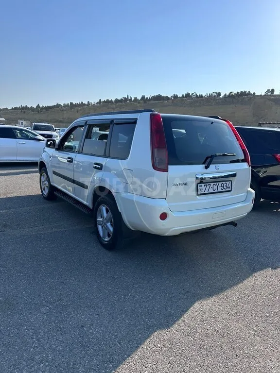 Nissan X-Trail — foto 4/4