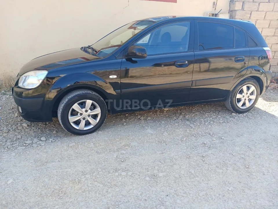 Kia Rio — foto 2/4