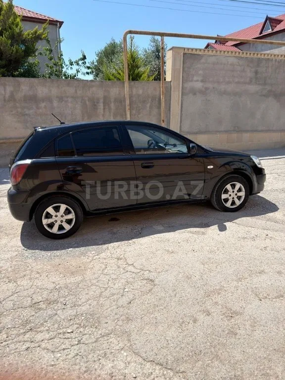 Kia Rio — foto 4/4