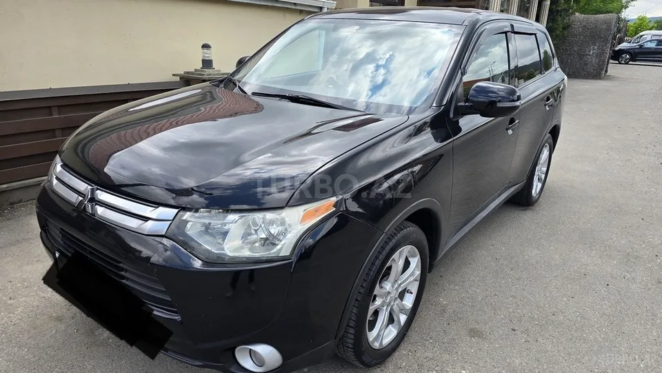 Mitsubishi Outlander — foto 1/4