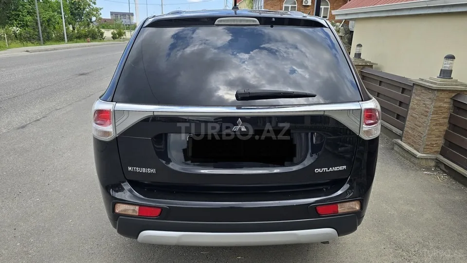 Mitsubishi Outlander — foto 4/4