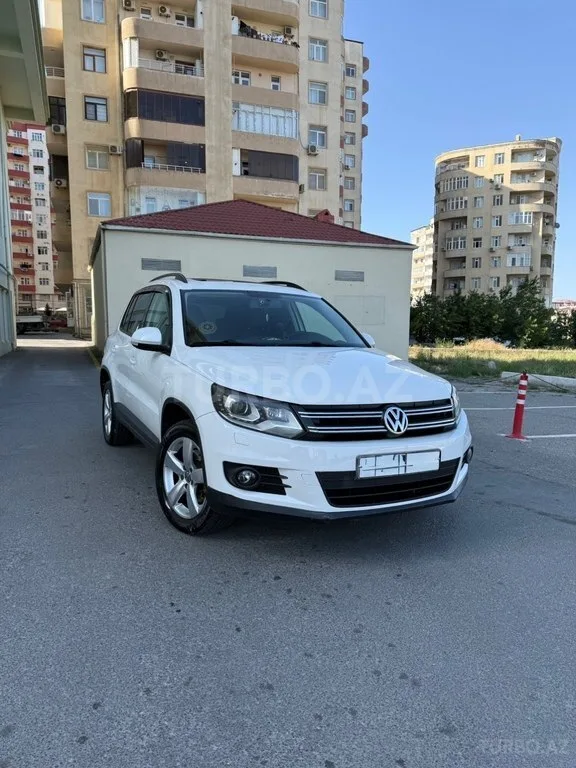 Volkswagen Tiguan — foto 1/4