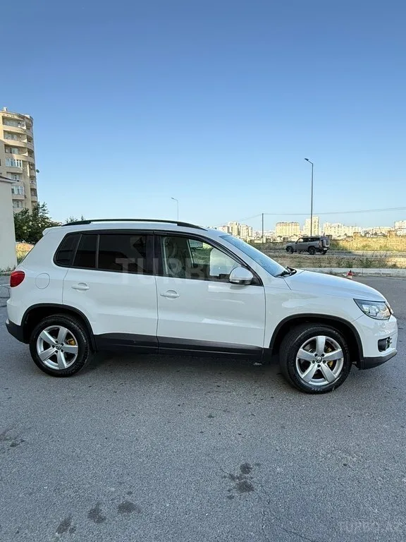Volkswagen Tiguan — foto 2/4
