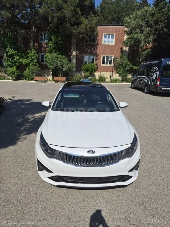 Kia Optima — foto 1/4