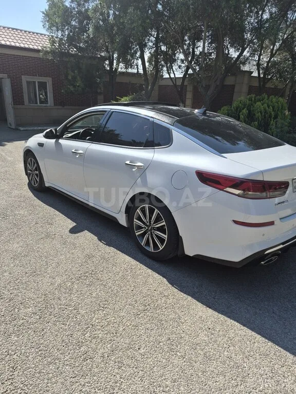 Kia Optima — foto 4/4