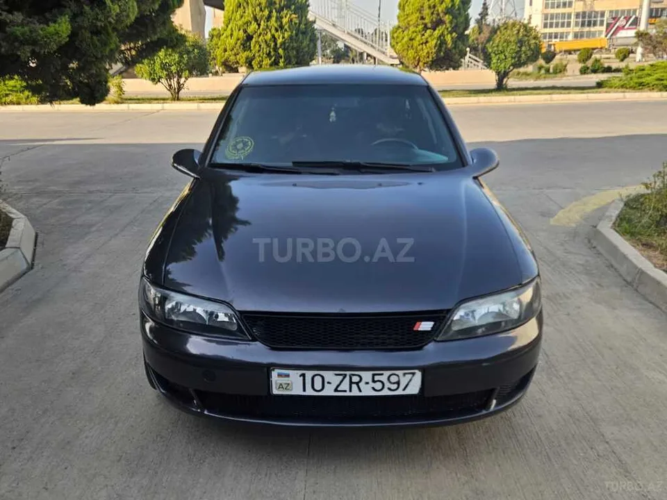 Opel Vectra — фото 1/4