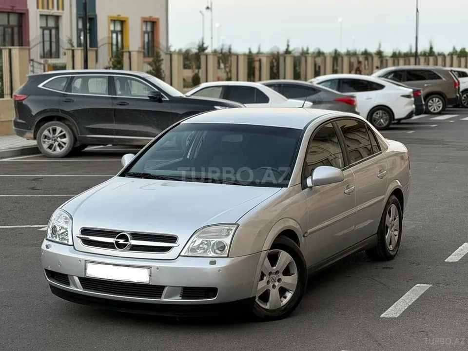 Opel Vectra — фото 1/4