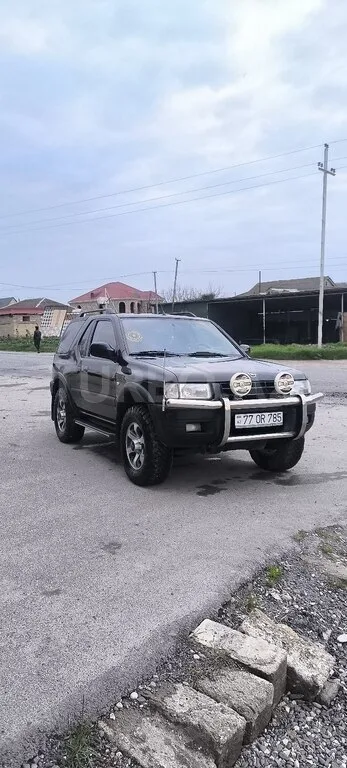 Opel Frontera — фото 1/4