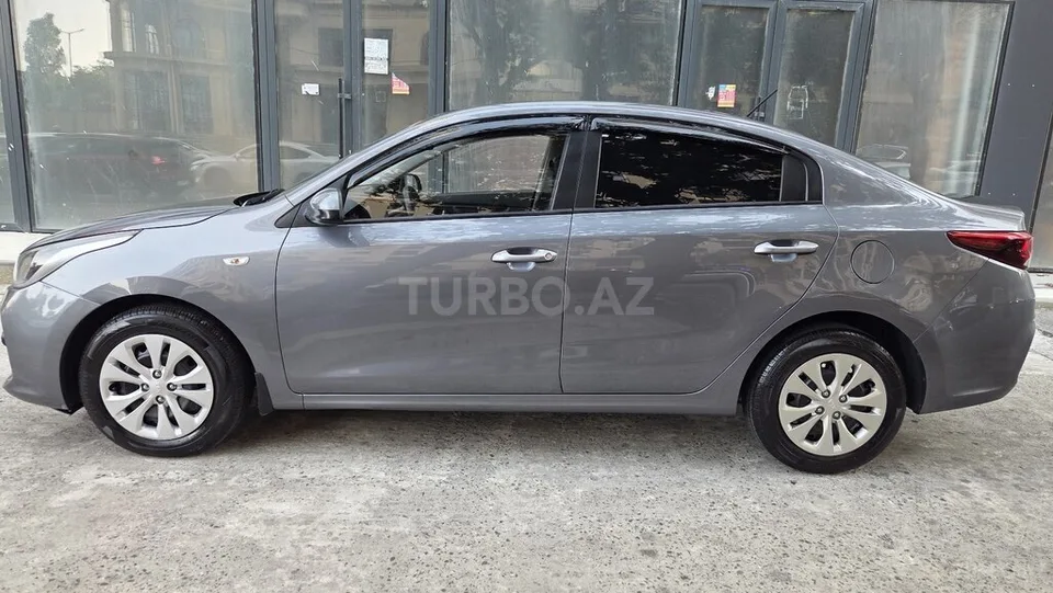 Kia Rio — foto 4/4