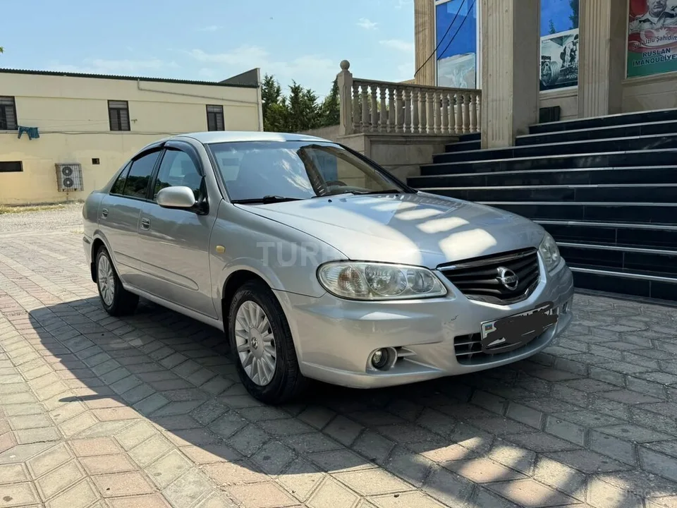 Nissan Sunny — foto 1/4