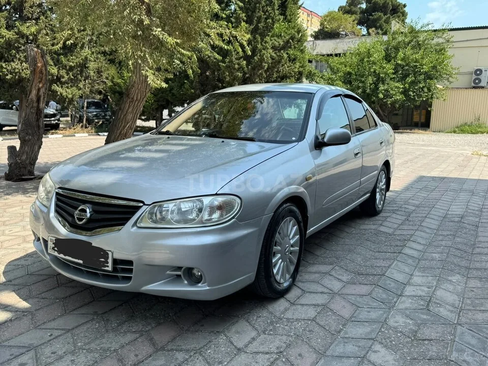 Nissan Sunny — foto 2/4