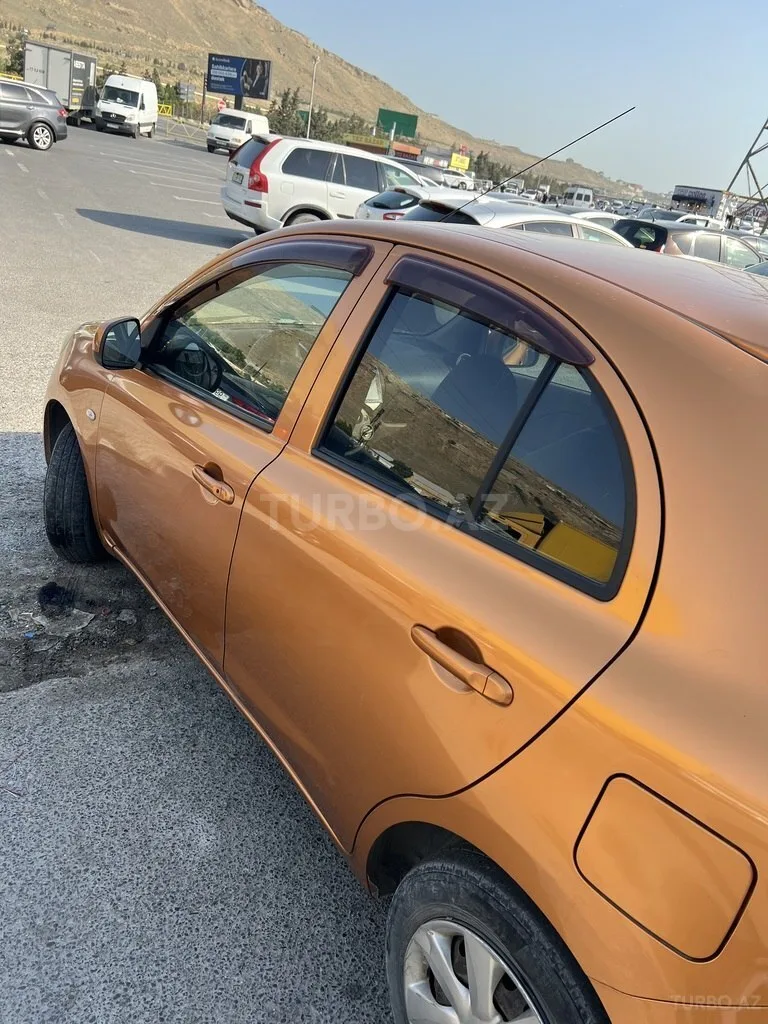 Nissan March — foto 4/4