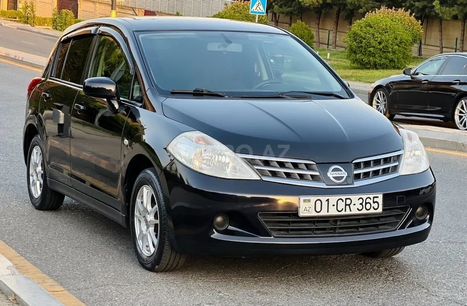 Nissan Tiida — foto 2/4