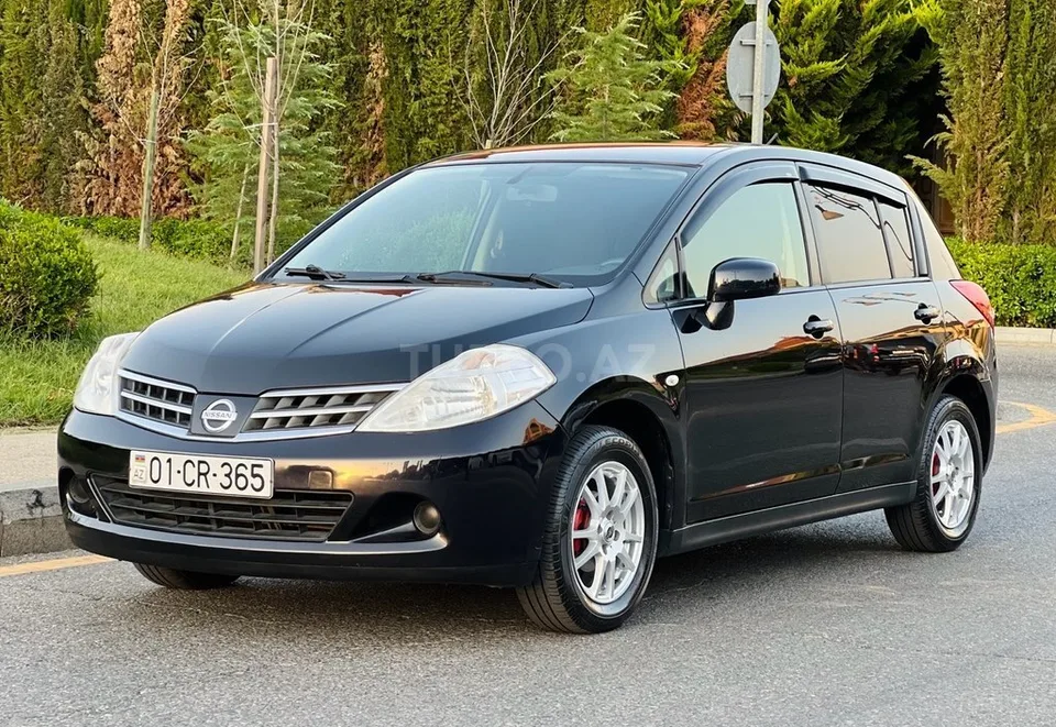 Nissan Tiida — foto 3/4