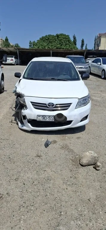 Toyota Corolla — фото 1/4